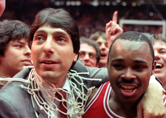 NC State's Jim Valvano (left) and Sidney Lowe (right) after NC State beat Houston to win the NCAA Championship in March 1983. Photo: The Charlotte Observer.