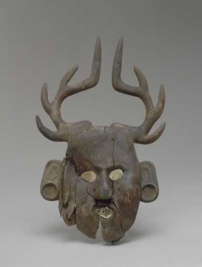 Human face effigy with deer antlers. Leflore County, Oklahoma, Spiro Site. 1200 – 1450 AD. Wood.