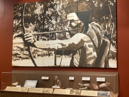 A display of artifacts and painting at the Spiro Mounds Archeological Site. Photograph by By Heide Brandes