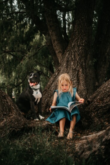 Angus and Avery enjoy story time together at the River Bend Ranch.