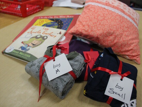 Each care package sent out by the Angel Heart Pajama Project includes pajamas, age-appropriate books, and a handmade "cuddle pillow".
