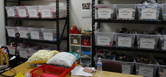 Residing at Wakefield Middle School, the storage shelves at Angel Heart Pajama Project overflow with generous donations.
