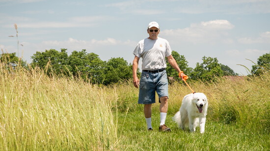 Volunteer dog walker Steve Paullus with Gunner.