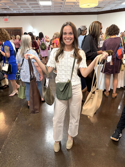 New to Knoxville, Community Relations Director of The Courtyard Senior Living Brittany Morton, found great deals in the Purse Madness Sale Room