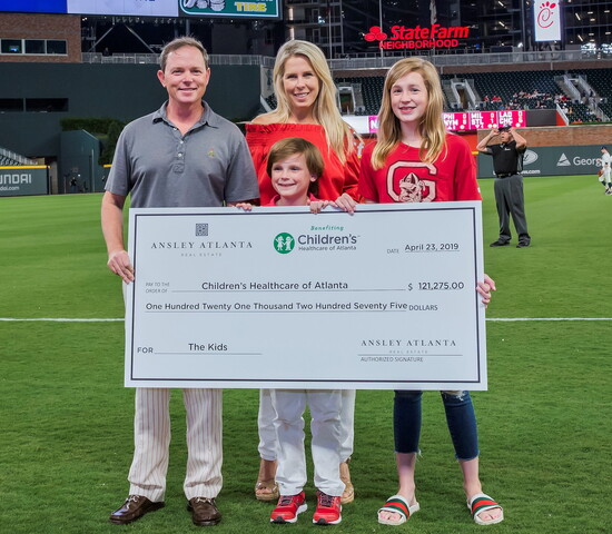 Ansley Real Estate Founder and Chairman Bonneau Ansley and his family had the honor of presenting a $121,275 check to Children's Healthcare of Atlanta.