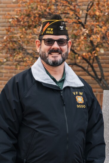 Post Adjutant Jason Riley, US Army.