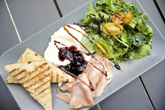 Burrata Salad with Benton’s shaved country ham. Photo: Oldham Hospitality