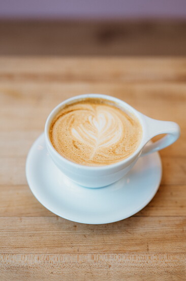 Beautifully crafted flat white. Photo by Marie Claire Photography.