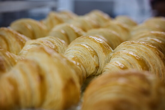 Oh the flaky, laminated layers of croissants, fresh out of the oven. Heaven!