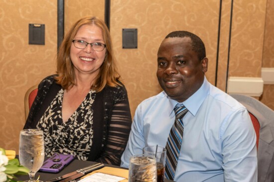 Staff members Beverly Eschbach and Albert Mosigisi