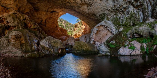  Tonto Natural Bridge State Park is located in central Arizona near Payson. It is believed to be the largest natural travertine bridge in the world. The bridge 