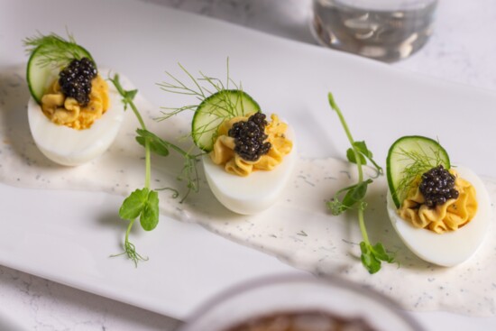 The Audrey's Caviar deviled eggs melt in your mouth topped with cucumber, caviar, and dill cream