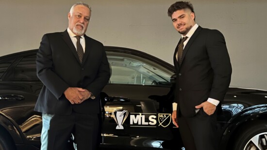 Kevin Illingworth, Classique Worldwide Transportation, CEO, and his son Cameron at MLS Event