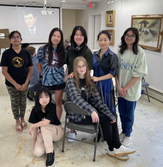 Longlong Zhou with some of her students at Longlong Art Studio
