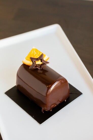 Chocolate & Orange  Buchette:  Chocolate sponge bake with chocolate and orange mousse filling with a hint of Grand Marnier