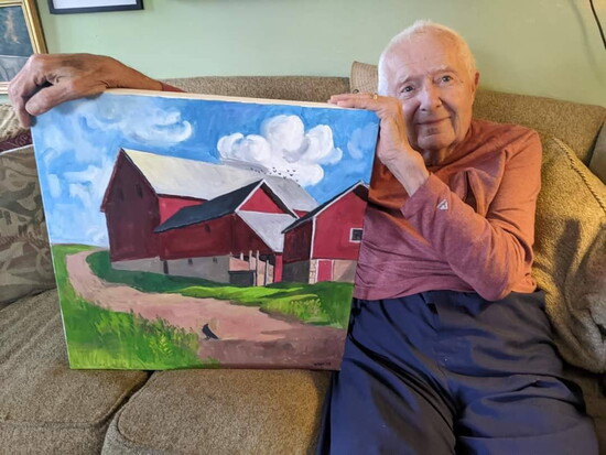 John Franklin Sauers with his artwork. Photo Credit: Michele Sauers