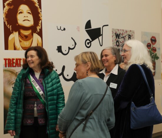 Carey Mack Weber (second from right) with guests at the "Women's Rights are Human Rights" exhibition last spring
