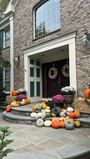 Fall porch vignettes by Heather of PUMPKIN & KALE CO. feature standout silhouettes and curated pumpkins that bring seasonal charm to every doorstep