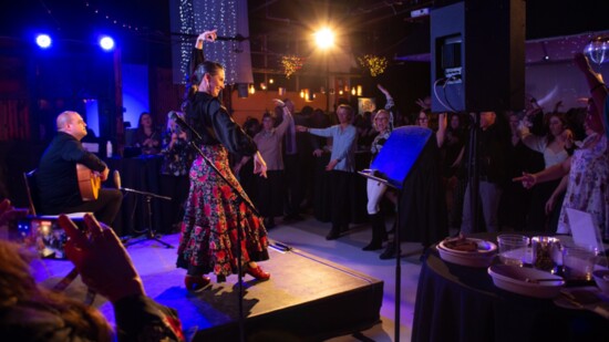 Flamenco artist and teacher Lindsey Bourassa teaching steps to guests at Portland Ovations' POP Annual Fundraiser in March 2023 (Photo: Katie Day)