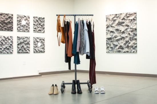 Foreground: Clothing and accessories from Pilar Boutique | Background: Art by Michael Anthony Simon