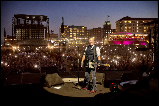 Bruce Springsteen beaming while performing at Sea.Hear.Now in 2024
