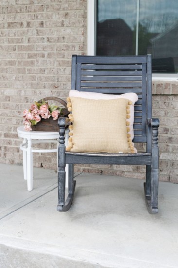 Rustic pillows provide extra comfort while rocking on the porch. Weather-resistant options are the most durable choice.