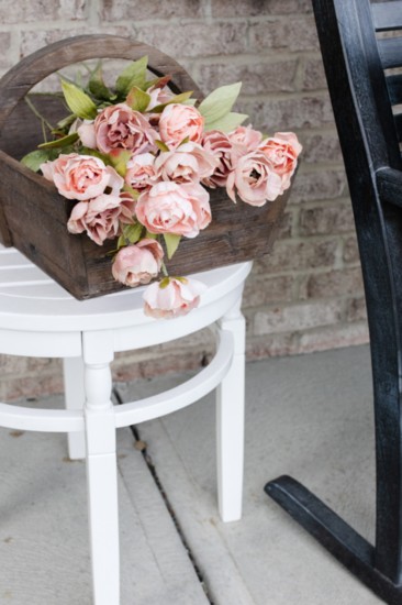 Silk flowers add a splash of color to your summer porch while requiring minimal maintenance.