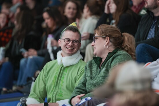 Voice of the GRIT Nick Kenny, dressed for the season, at a game