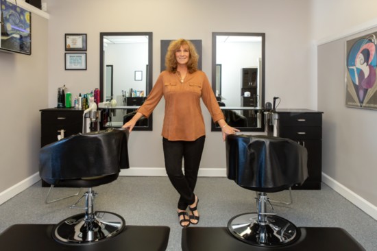 Lucy Becht in her salon. Her philosophy includes health and wellness.