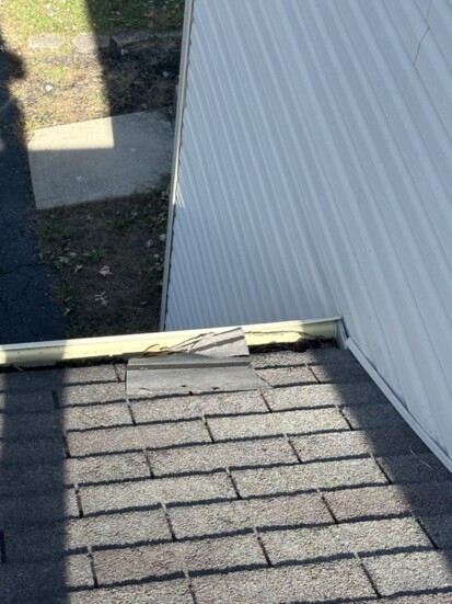 Roof shingle storm damage