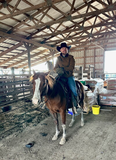 Heading out to work the cows at partner Larry Ludeke’s ranch in Liverpool.