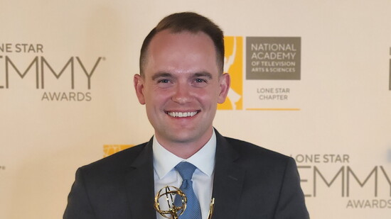 Avery Tomasco accepting his Lonestar Emmy award.