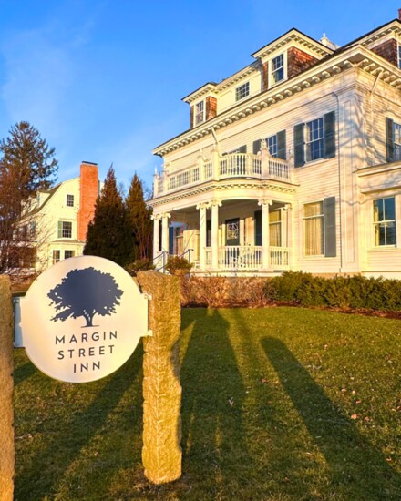 Margin Street Inn bathed in the golden glow of sunset