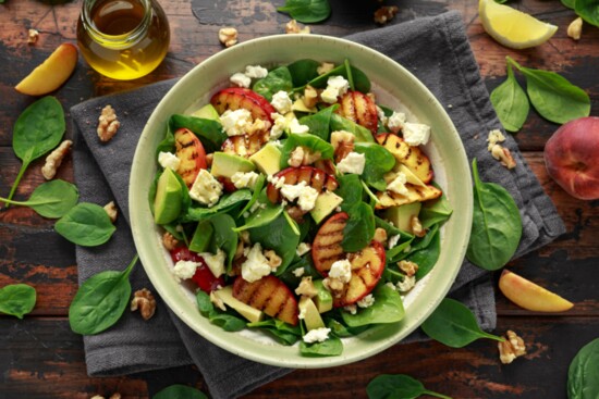 Avocado and peaches in a salad? Give it a try!