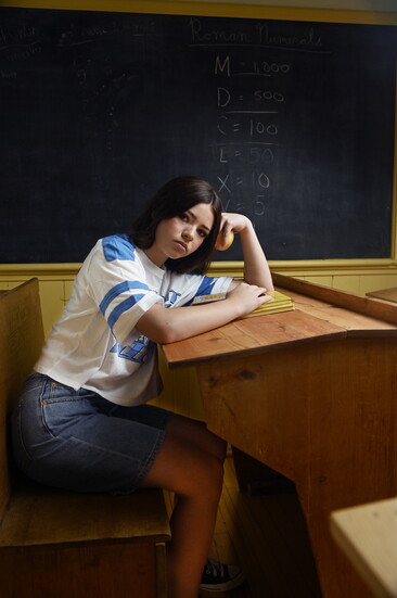 On Mary: Junk Food Detroit Lions Cropped Tee; Still Here Cool Shorts.