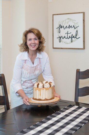 Rita showcases her made-from-scratch pumpkin spice cake masterpiece.