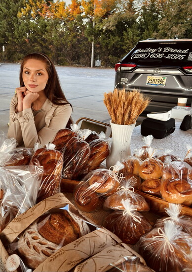 Bailey’s Bread Owner Bailey Falkner is pictured at the Festhalle Farmers Market in Cullman.