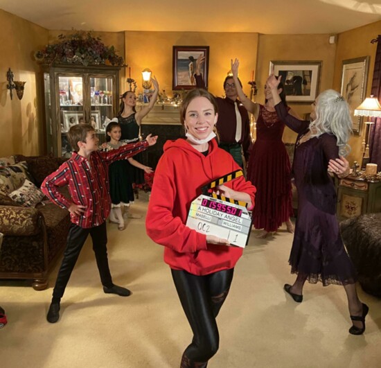 Cast members filming "A Holiday Angel": L-R: Finn Harrington, Annie Regan, Mia Nelson, Jonathan Sharp, Jamie Regan, Colleen O’Callaghan; center: Ariana Dewing