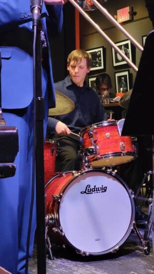 Alex on drums.