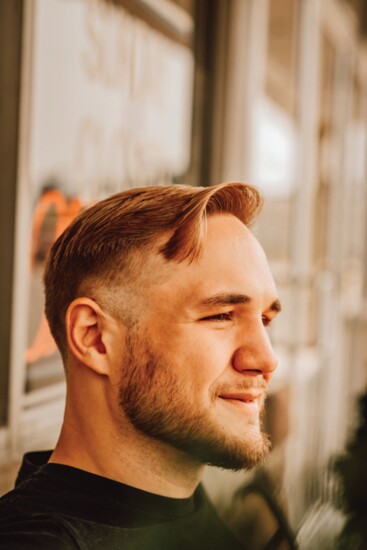 Steve Sparks, certified personal trainer and owner of Just Livin' Clothing Co., LLC, receives a low skin drop fade. (Stylist - Tyler Tribby)