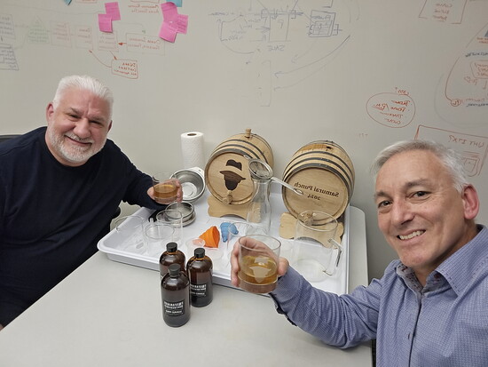 Ralph Dandrea (L) and Sean Flaherty (R) sampling a batch of cocktails in 2025.