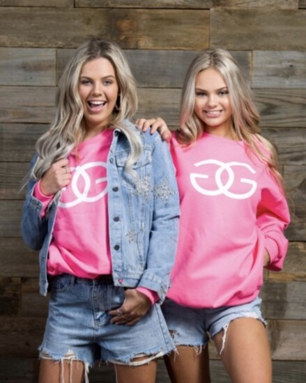 Madi and Molly in denim and a fun colorful oversized long sleeve crew. 