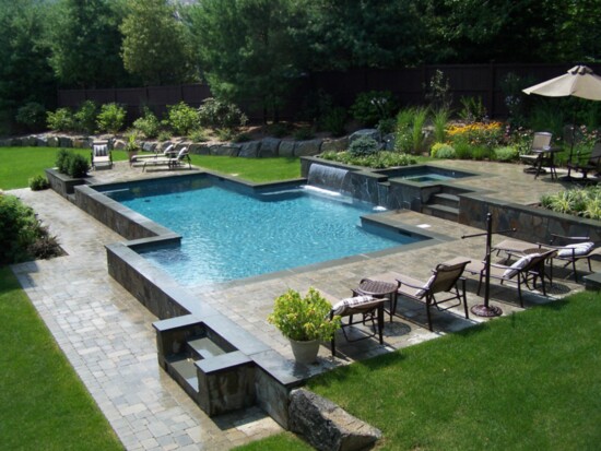 Pool with waterfall element. (Photo: Krisscendo LLC)