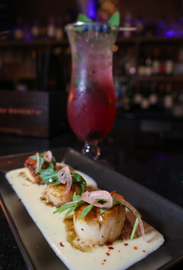 Seared Diver Scallops served with a Blueberry Mojito