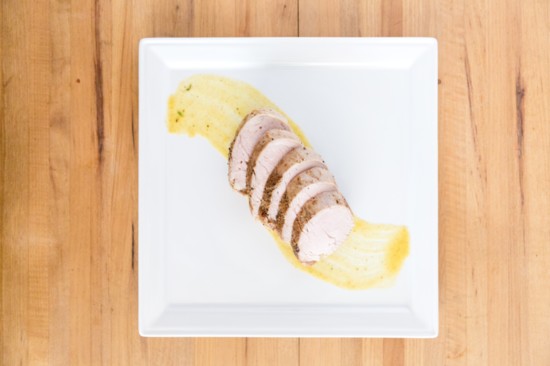 Place sliced pork tenderloin on top of the brush stroke.