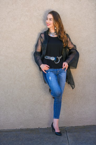 Krista Souther wears a Samuel Dong sheer black blouse ($129) offset with an Anthony Alexander belt ($149) and Jag Jeans ($89).