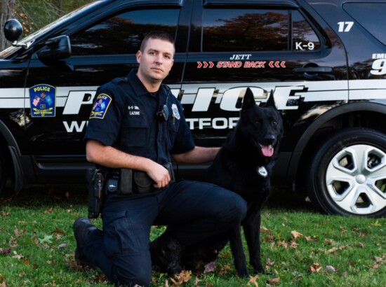 Lt. Tom Lazure, who recently retired, with K-9 officer 