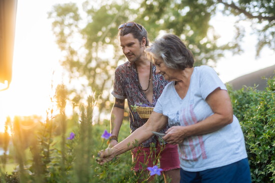 Greg and his mother in one of her gardens
