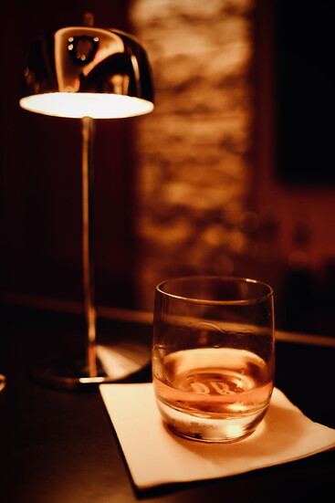 Bourbon is poured at the bar during a special event at Pappas Bros. Steakhouse