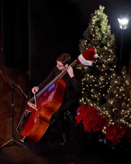 Photo credit: Andrew Miner, A member of the Parker Symphony Orchestra performs with the Parker Chorale at the annual favorite, A Classic Parker Holiday.